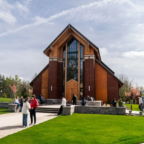 View of the chapel on a sunny day with students out front