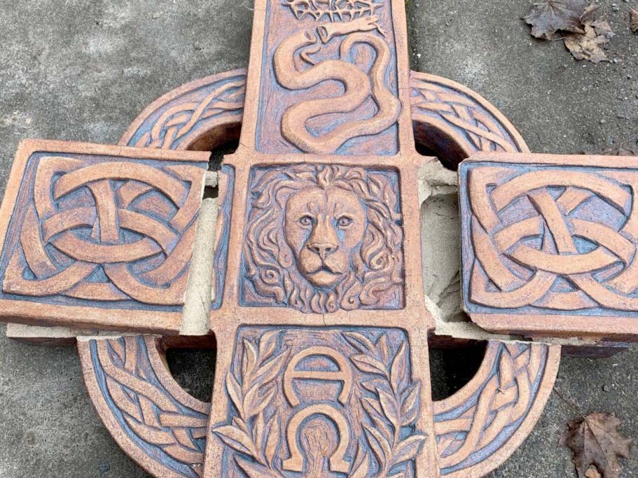 Broken pottery cross