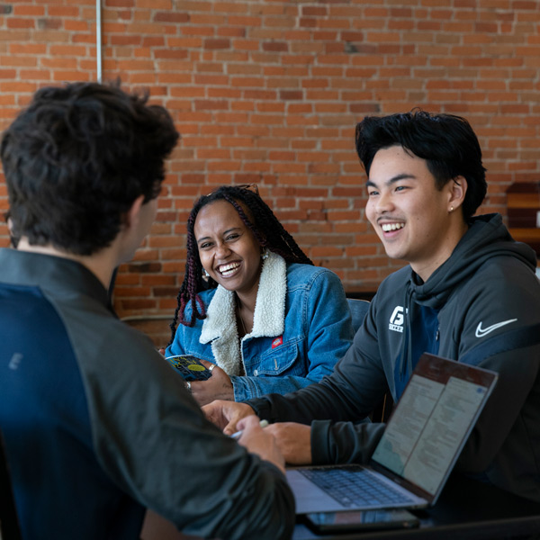 students work in a cafe