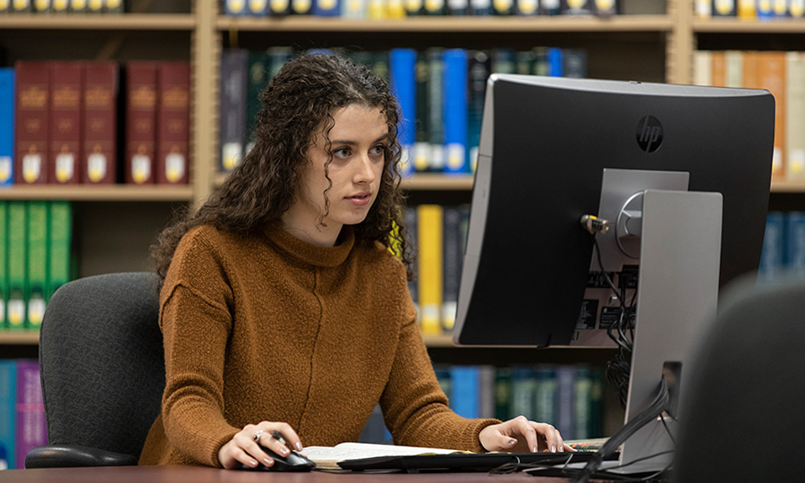 A student working on her certificate program