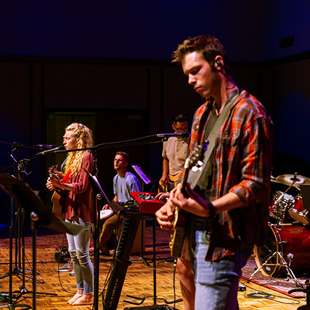 Musicians playing during chapel