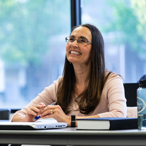 female student engaged in class