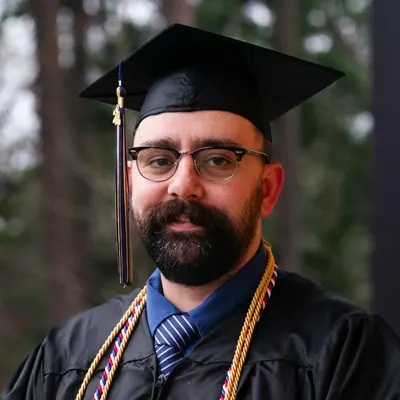 Mitchell Stephens portrait in graduation attire