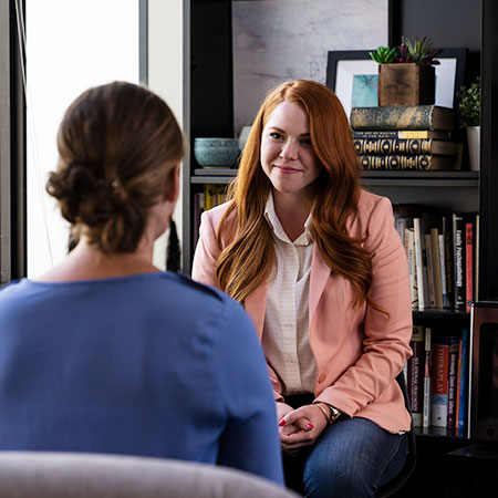 Counselor having a conversation with a patient.