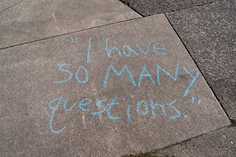 Chalk art that says: I have so many questions