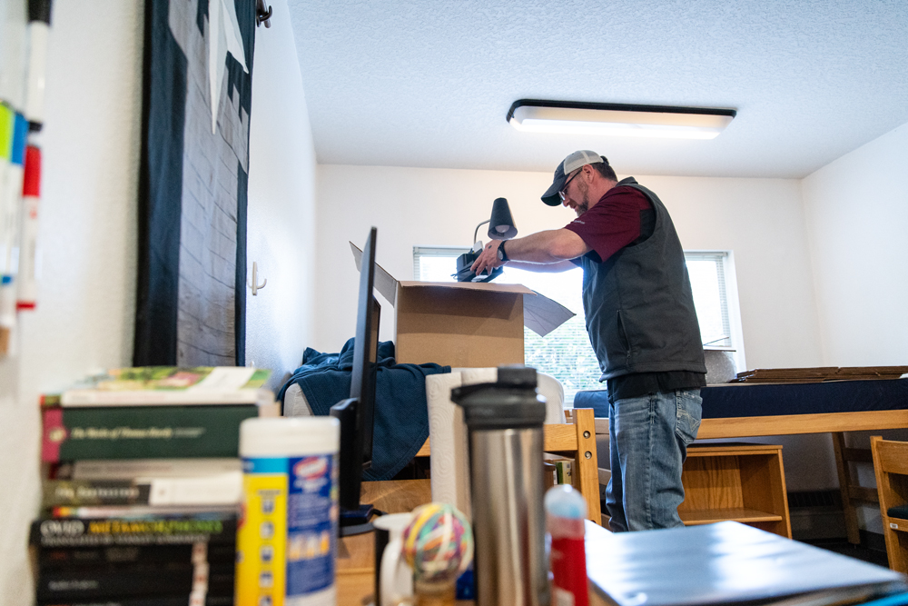 Volunteer packing a dorm