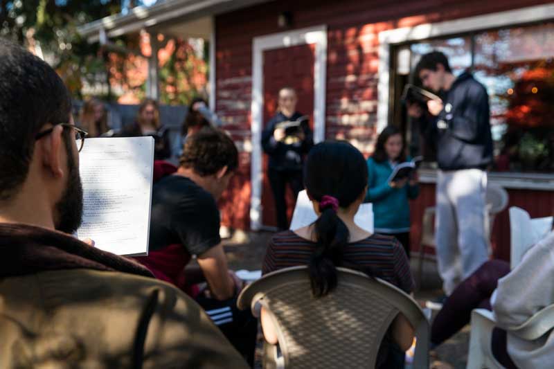 Honors students read together outside