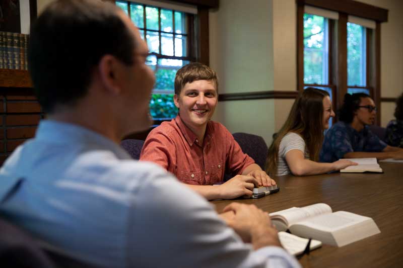 A student speaks during a Socratic seminar