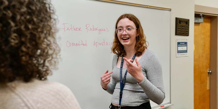 Emmy King in a classroom