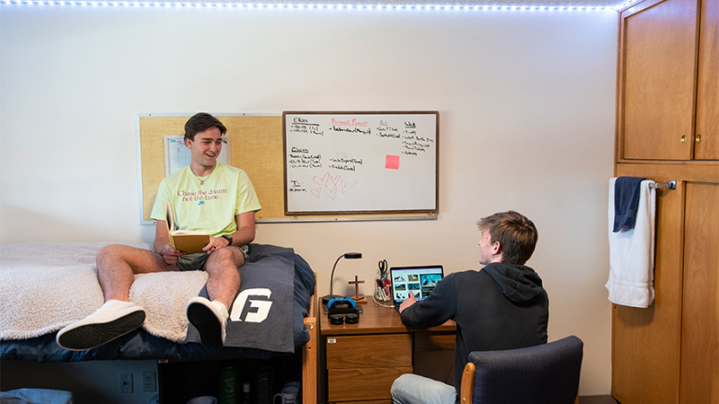 Two boys in their dorm room in Sutton Hall