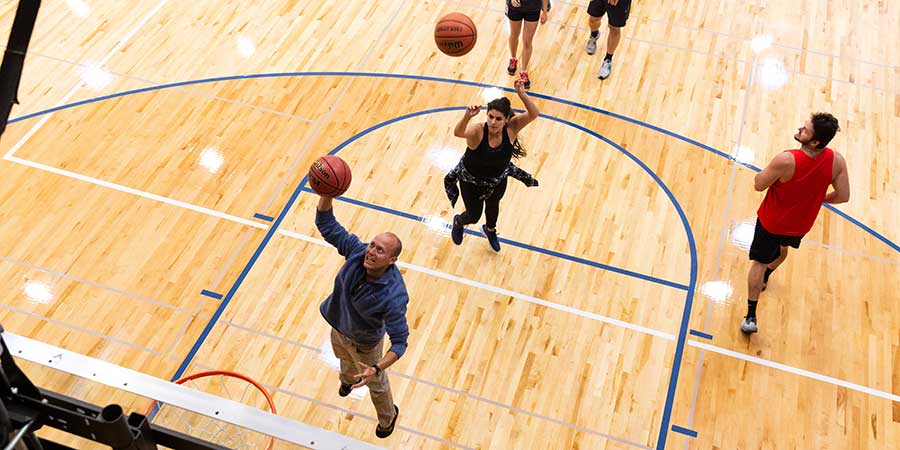 students playing basketball