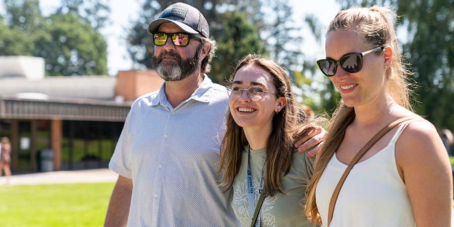 Smiling Student with Parents