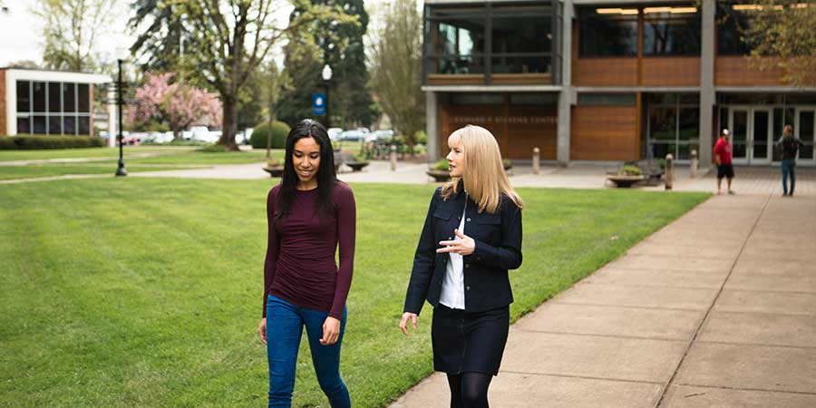 students on quad side walk