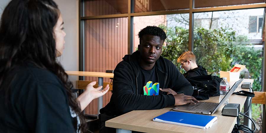 homework being done in a dorm lobby