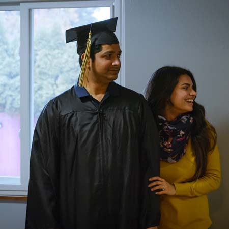 Suhail in his graduation cap and gown