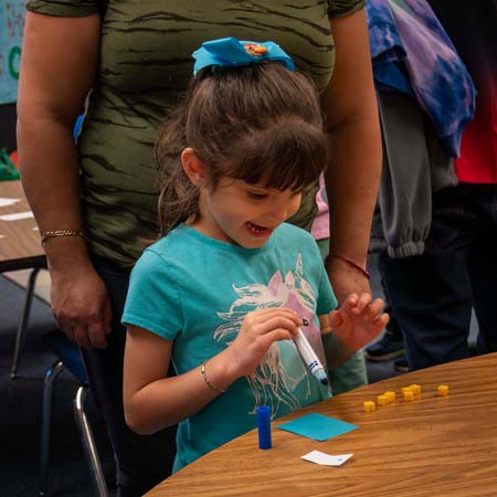 A happy student working on math