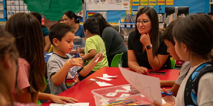 A student teaching at math night