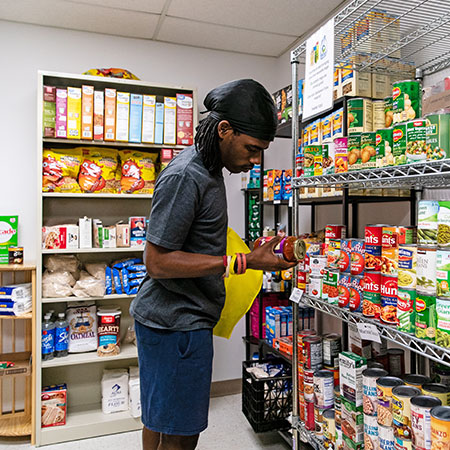 student holding food