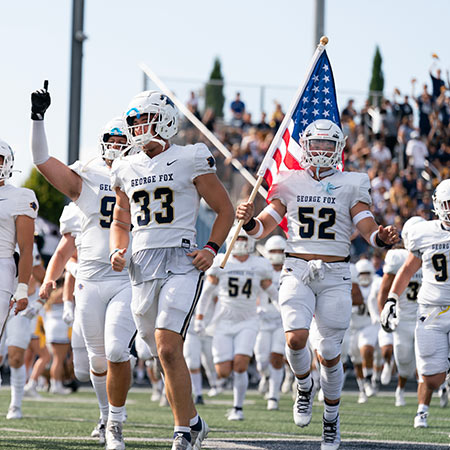 football players running