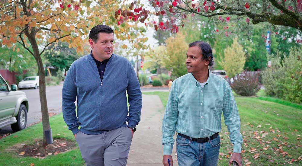 Stanley Paul walking with someone