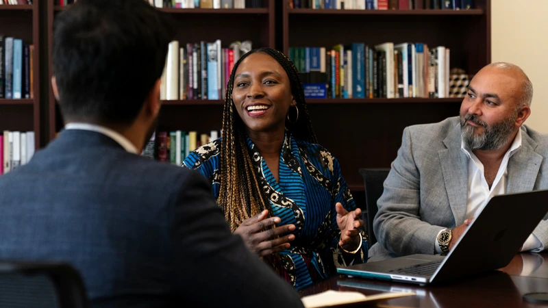 Bili Sule in a meeting