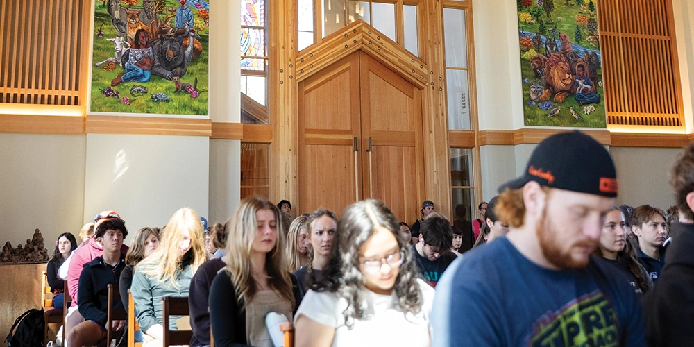 Students sitting inside the Chapel