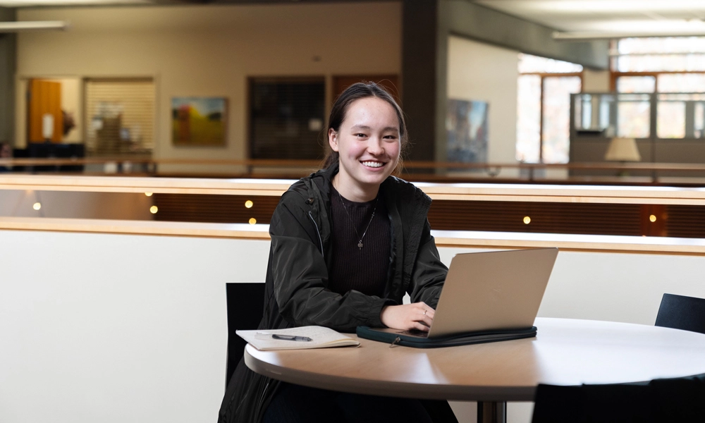 Sophie Roberts working on her George Fox Digital classwork