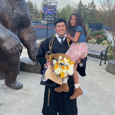 Rodriquez at his commencement ceremony with his daughter