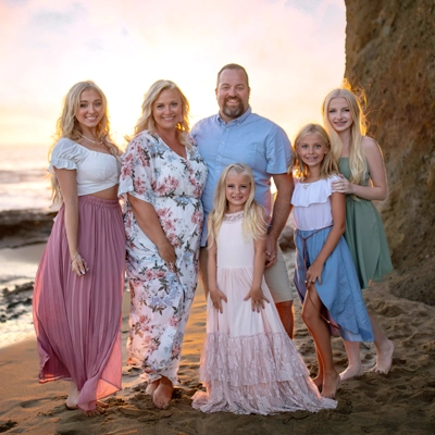 family portrait of Wayne Dorman with his wife and kids