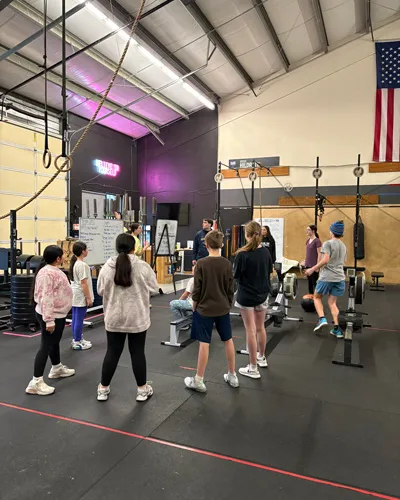  A group of young kids participate in a fitness camp