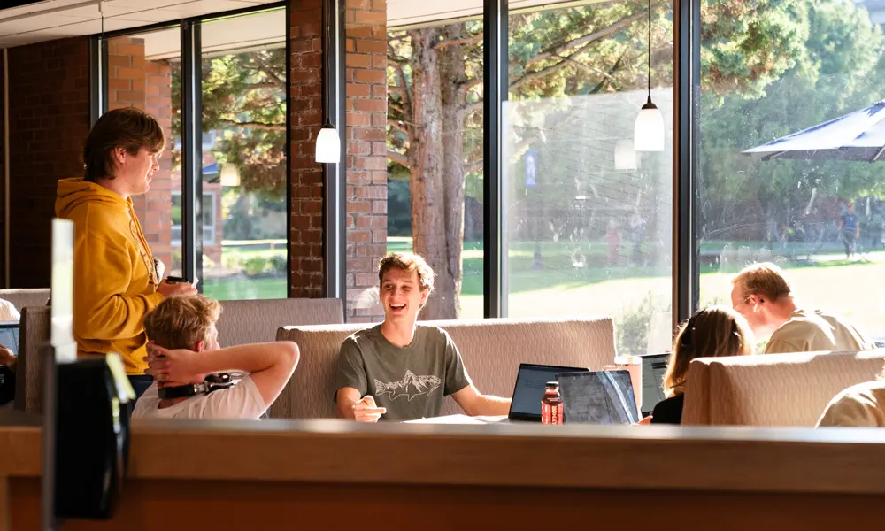 6 students study in the Klages dining area