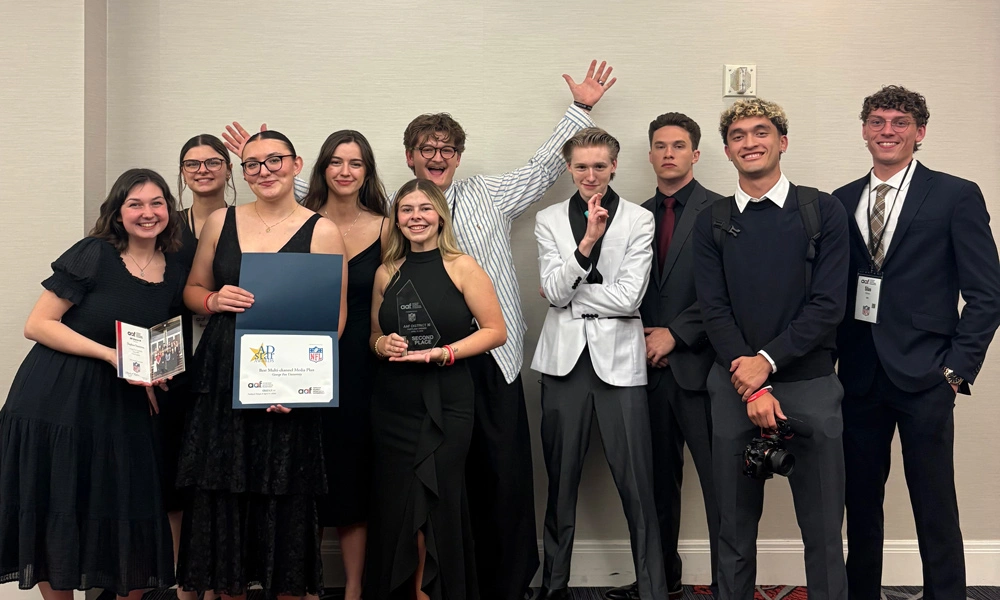NSAC students smiling for a picture with their second place awards