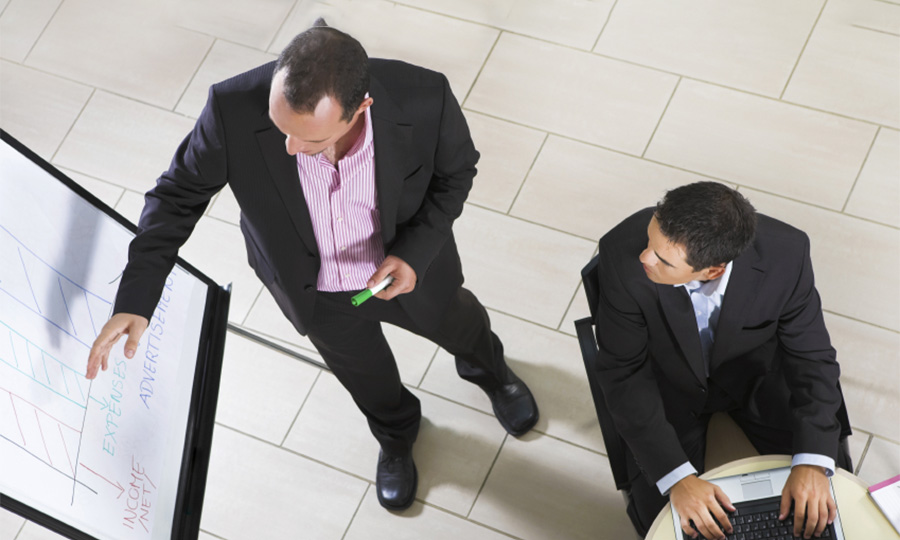 Two business professionals working on some presentations