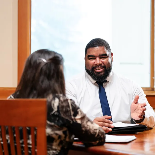 two MBA professionals have a meeting together
