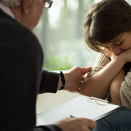 Chaplain providing support to a person in difficult situation