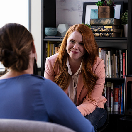 A counselor talking with her client