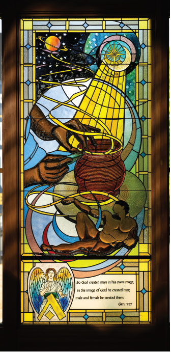 Stained glass window depicting the creation of humanity in the image of God, illustrating Genesis 1:27