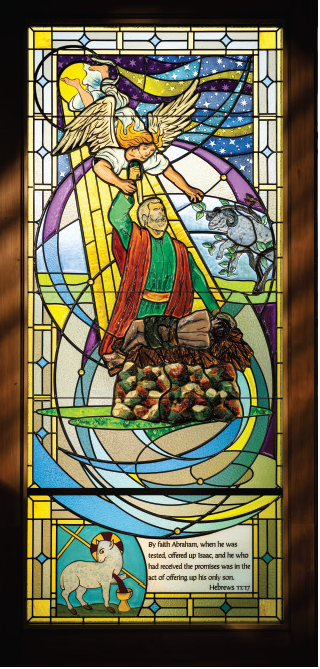 Stained glass window depicting Abraham offering Isaac, illustrating Hebrews 11:17