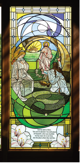 Stained glass window depicting the angel at the empty tomb announcing the resurrection, illustrating Mark 16:6