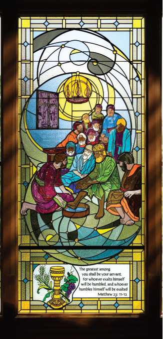 Stained glass window depicting Jesus teaching about humility, illustrating Matthew 23:11-12