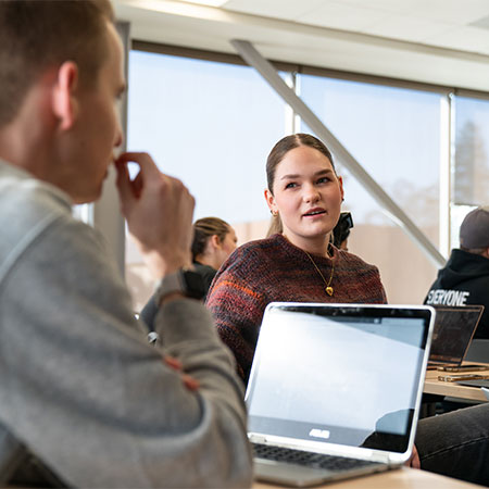 Students having conversations during class