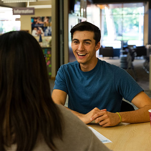 Student talking with a counselor