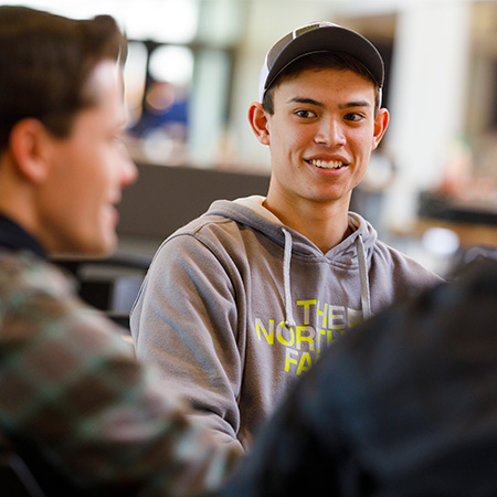 Student talking with his advisor