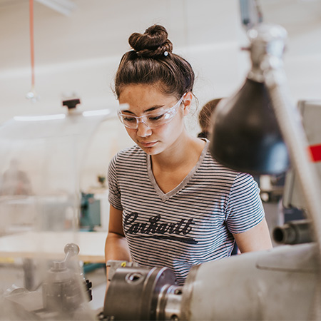 Engineering student working on a project