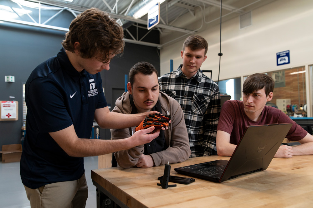 servant engineering students work in a home