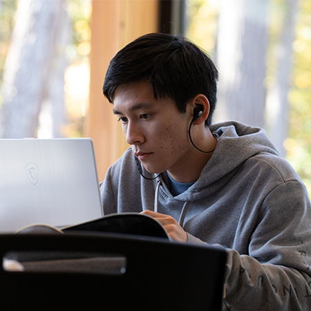 Student works on computer