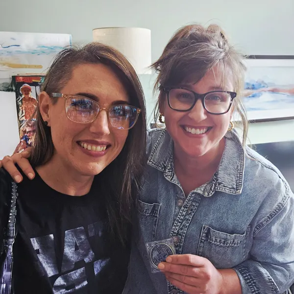 Megan and Lindsey smile for a selfie