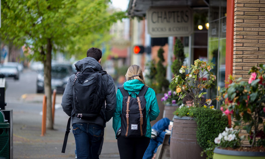 Students walk through downtown