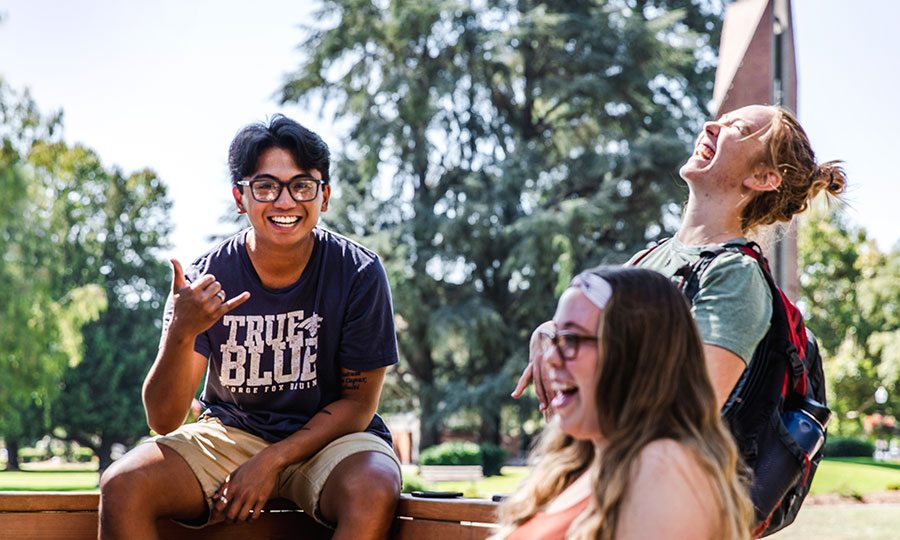 Students having a joyful moment on campus