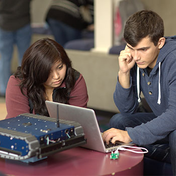 students working on robotics